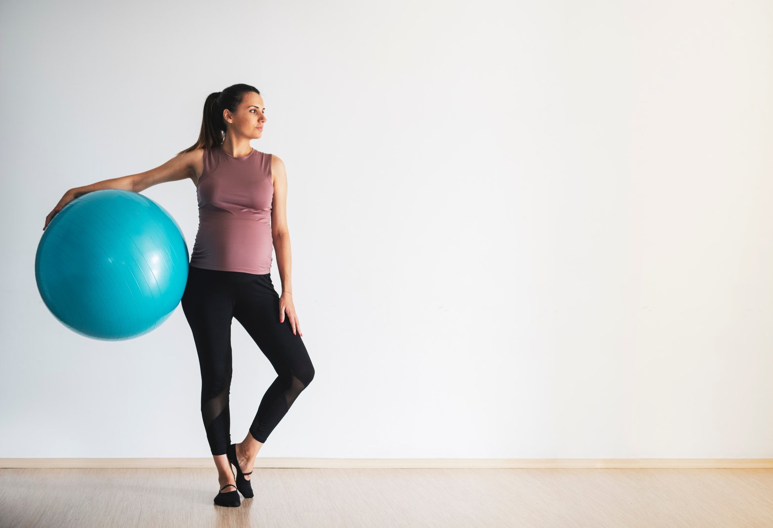 Pregnant women doing Pilates